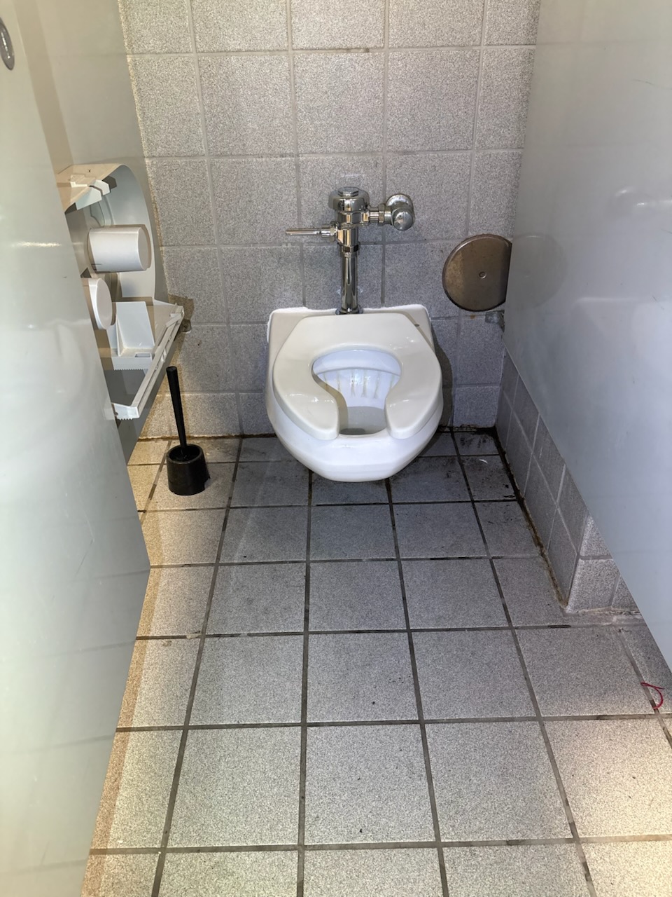 Commercial restroom by Livas Contracting Services, Katy TX: Flushometer toilet set and sealed