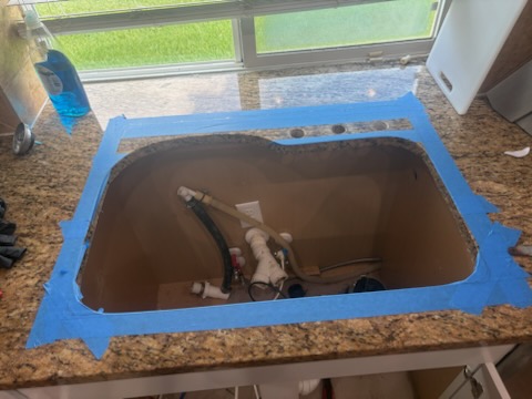 Sink replacement, during by Livas Contracting Services, Katy TX: Cutout taped and prepped