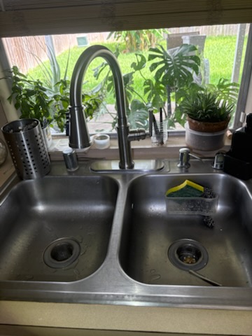 Stainless sink by Livas Contracting Services, Katy TX: Set, sealed and connected