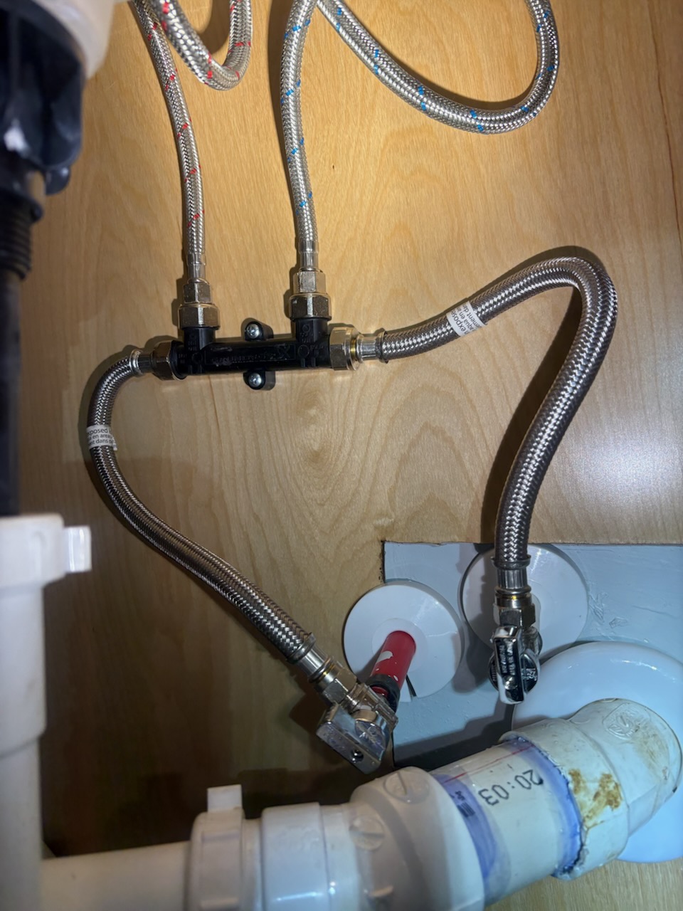 Supply lines by Livas Contracting Services, Katy TX: Braided supplies and mixing valve, tidy