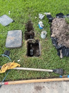 Water meter box by Livas Contracting Services, Katy TX: Service line dug out and repaired